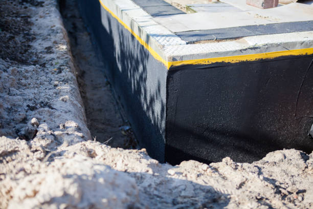 Professional Waterproofing technician working in Modoc, IN